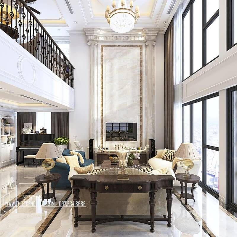 Không gian phòng khách căn hộ Duplex Thanh Xuân Hà Nội được trang trí bằng sản phẩm kệ trang trí kệ decor bằng gỗ óc chó cao cấp.